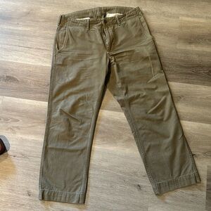 Buck Mason Green carry-on pant.
